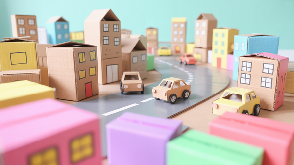 Construiește un oraș din cutii: provocări de engineering creativ cu materiale reciclate